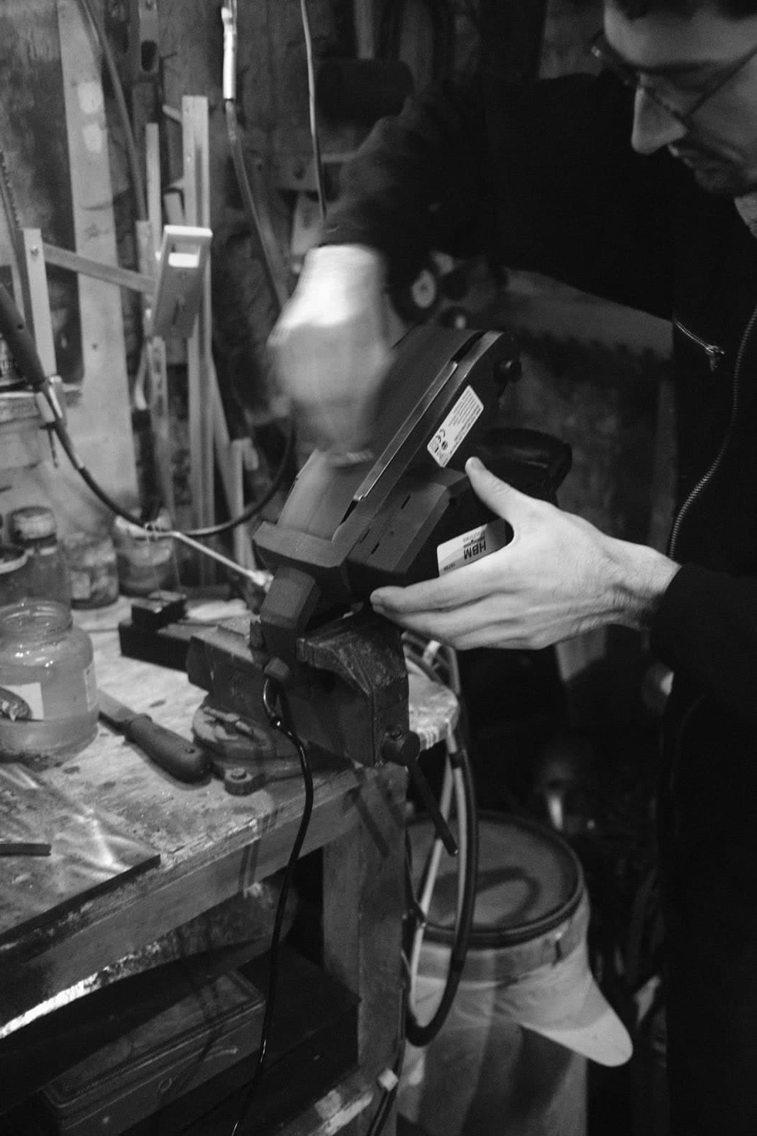 Grinding a piece by hand, motion blur